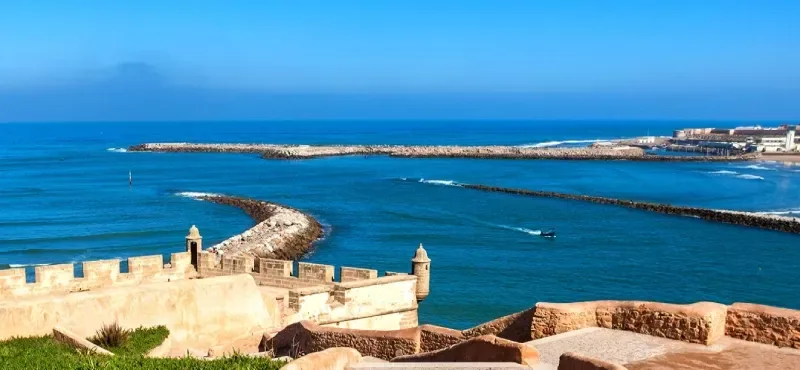 Sunny Rabat beaches with golden sand and blue sea under clear sky